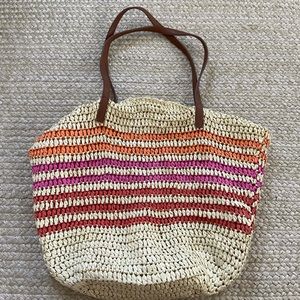 Trendy woven straw beach bag. Perfect tote bag